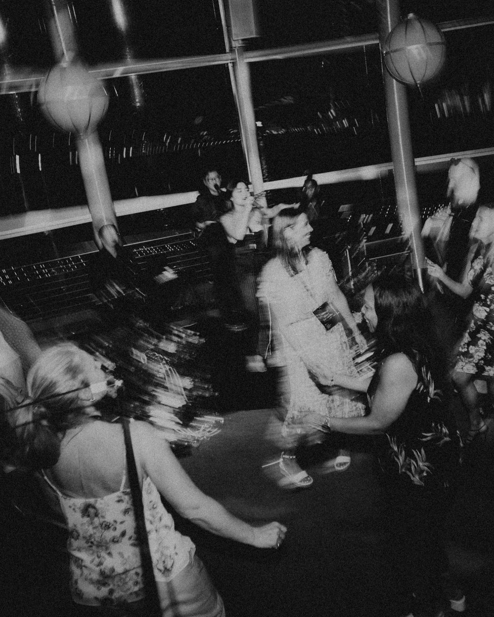 Guests dancing at a private party with a live band